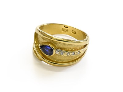 Lot 237 - A Synthetic Sapphire and Diamond Ring, stamped...
