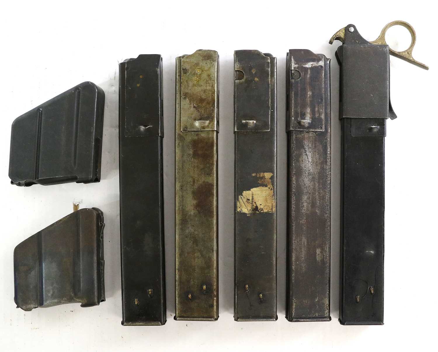 Lot 239 A Collection of Sixteen Sten Gun Magazines,