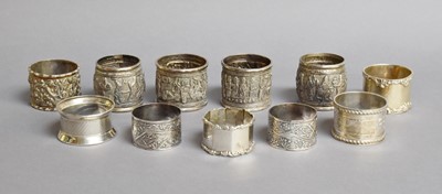 Lot 214 - A Collection of Various Napkin-Rings,...