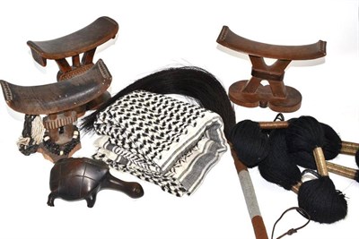 Lot 32 - Small quantity of ethnographica including three head rests, a fly whisk etc