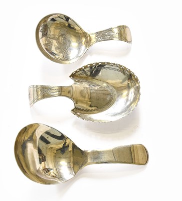 Lot 137 - Three George III Silver Caddy Spoons, one...