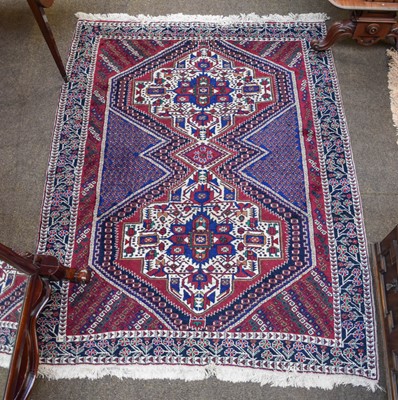 Lot 1204 - A Lesghi Design Rug, the ivory ground with...