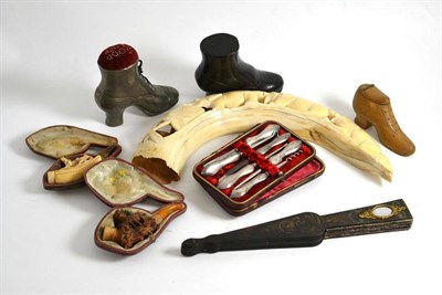 Lot 44 - Carved hippopotamus tusk, three ornamental shoes, two pipes etc