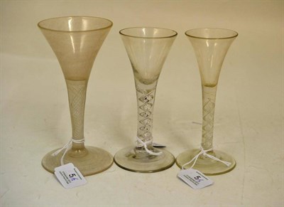 Lot 5 - A Wine Glass, circa 1750, the bowl on an air twist stem, 15cm high; A Similar Wine Glass,...