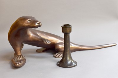 Lot 311 - A Patinated Composition Sculpture of an Otter,...