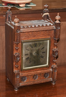 Lot 328 - A German Oak Quarter Striking Table Clock,...