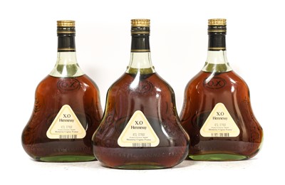 Lot 5190 - Hennessy X.O. Cognac (three bottles)