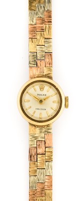 Lot 2424 - Rolex: A Lady's 9 Carat Gold Wristwatch,...