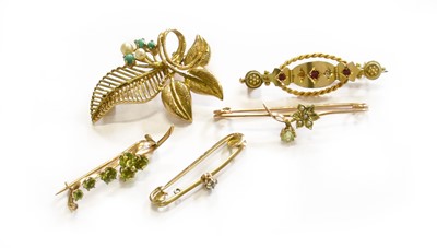 Lot 157 - Five Brooches, of varying designs, including a...