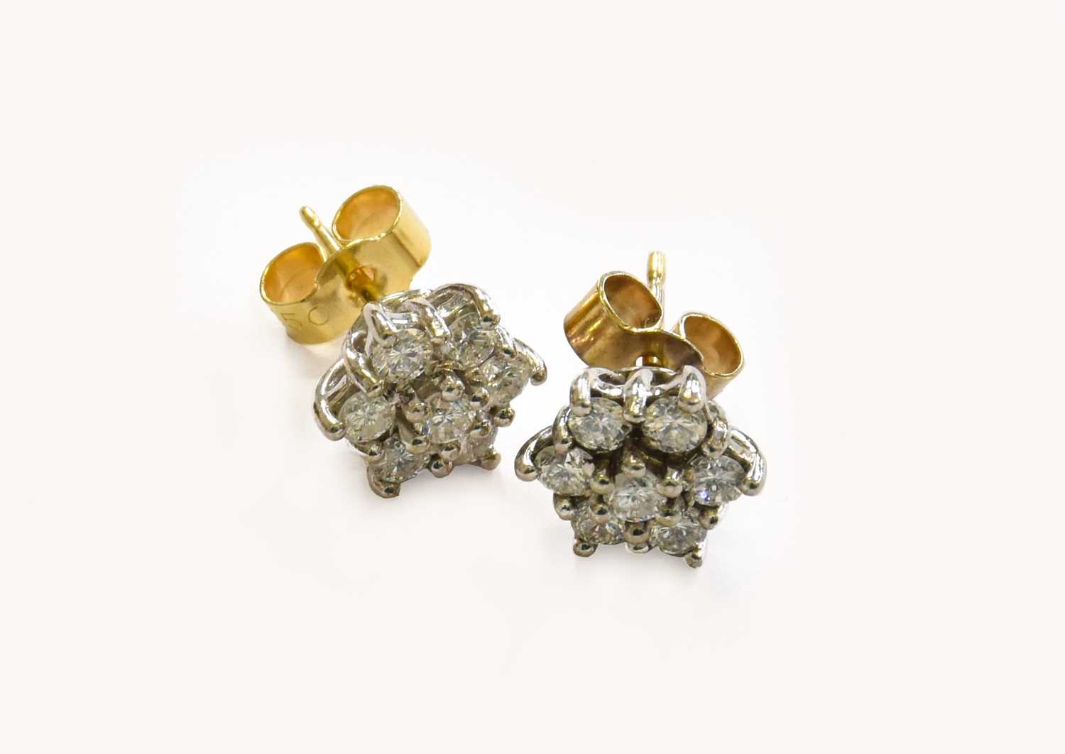 Lot 179 - A Pair of 18 Carat Gold Diamond Cluster...