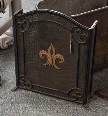 Lot 1235 - A Wrought Iron Spark Guard, with fleur-de-lis...