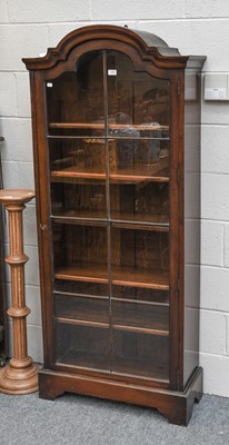 Lot 1260 - A Mahogany Glazed Bookcase with Dome Top,...