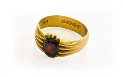 Lot 218 - A 22 Carat Gold Garnet Ring, finger size O