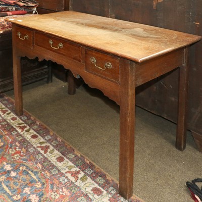 Lot 1338 - An Oak Three Drawer Lowboy, 18th century, with...