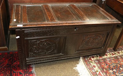 Lot 1339 - An Oak Panelled Coffer, 17th century, carved...