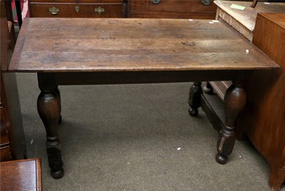 Lot 1350 - An Oak Plank Top Table, 18th century, with...