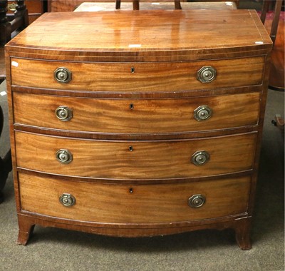 Lot 1355 - A George IV Mahogany Bow Front Chest, of four...