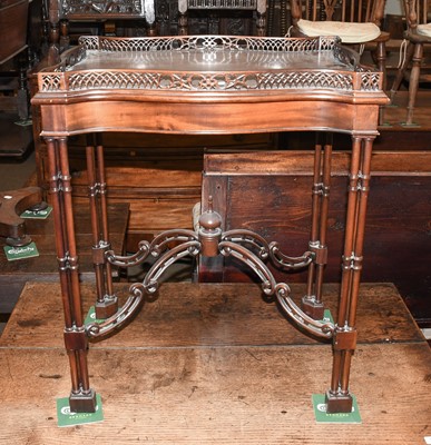 Lot 1396 - A Reproduction Mahogany Tray Top Silver Table,...