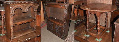 Lot 1406 - A 17th Century Style Carved Oak Open Bookcase,...