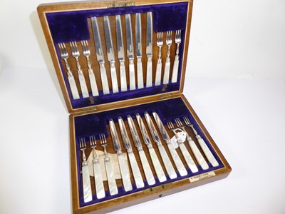 Lot 2054 - A Cased Set of Twelve Pairs of George V Silver and Mother-of-Pearl Fruit-Eaters