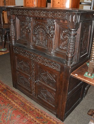 Lot 1419 - A 17th Century Style Heavily Carved Court...