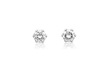 Lot 2346 - A Pair of Diamond Solitaire Earrings the round...