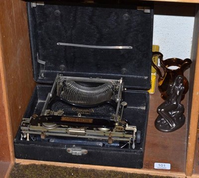 Lot 101 - An L C Smith & Corona portable typewriter in original case, a Wade copper lustre jug, a bronzed...