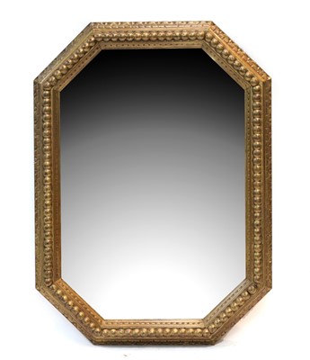 Lot 774 - A Giltwood and Gesso Octagonal Wall Mirror,...