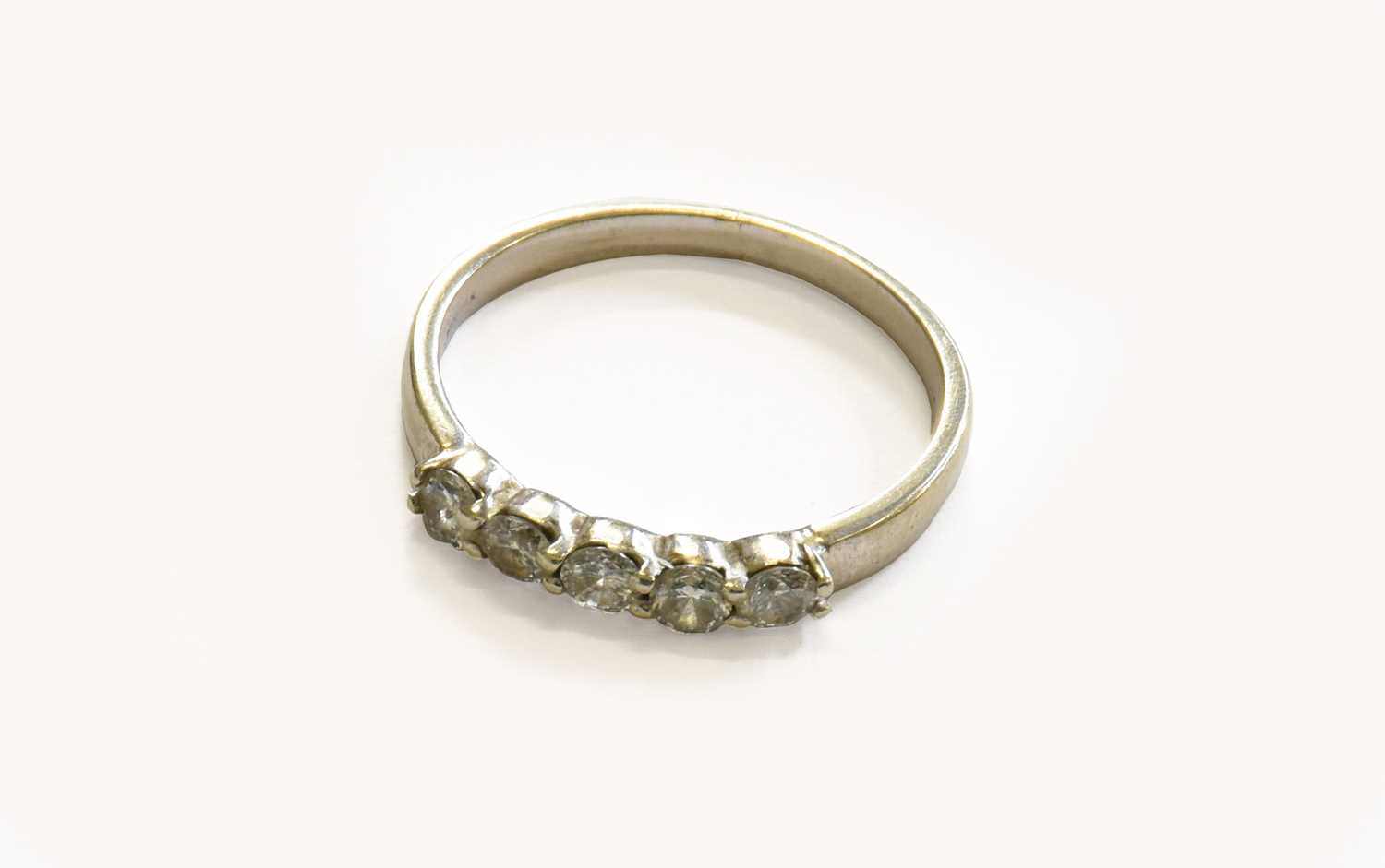 Lot 160 - A Diamond Five Stone Ring, the round brilliant...