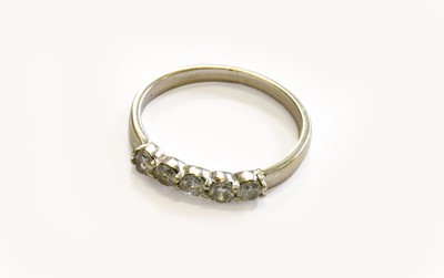 Lot 160 - A Diamond Five Stone Ring, the round brilliant...