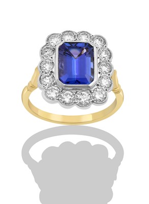 Lot 2264 - A Tanzanite and Diamond Cluster Ring the...