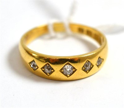 Lot 112 - An 18ct gold gypsy ring set with diamonds