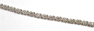 Lot 118 - A 9ct white gold diamond bracelet