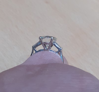 Lot 2100 - A Platinum Diamond Solitaire Ring the round...