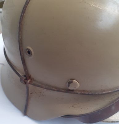 Lot 125 - A Second World War German M35 Helmet, finished...