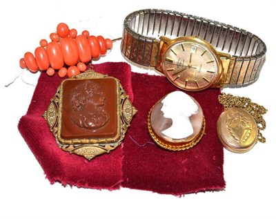 Lot 122 - A coral brooch, a cameo brooch, locket, watch etc