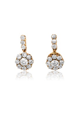 Lot 2431 - A Pair of Diamond Drop Earrings the central...