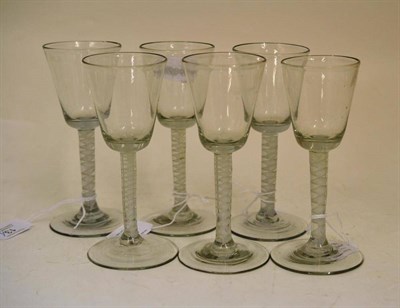 Lot 13 - A Set of Six Wine Glasses, circa 1755, the flared bucket shaped bowls on opaque twist stems,...