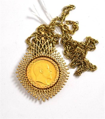 Lot 128 - A 1/2 sovereign loose set as a pendant in a 9ct gold mount with gilt chain