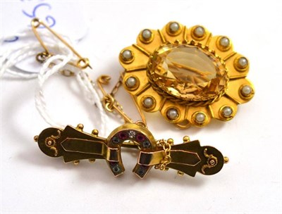 Lot 133 - A citrine and seed pearl brooch in a 9ct gold mount and a 9ct gold bar brooch