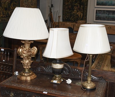 Lot 1174 - A Modern Gilt Wood Table Lamp, in the form of...