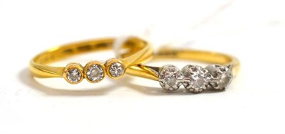 Lot 147 - Two three stone diamond rings