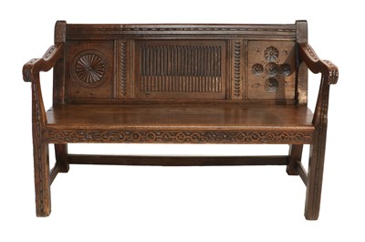 Lot 617 - A Joined Oak Settle, the moulded top rail...