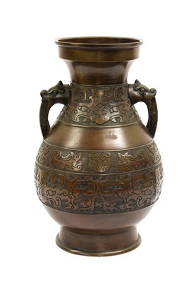 Lot 259 - A Chinese Bronze Vase, in Archaic style, of...