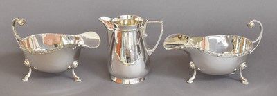 Lot 11 - A Pair of Elizabeth II Silver Sauceboats, by...