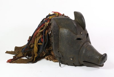 Lot 228 - A Chokwe Pig Mask, Angola, of carved wood...