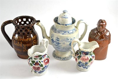 Lot 177 - Mixed ceramics including a Doulton stoneware figural gin flask, a treacle glaze puzzle jug,...