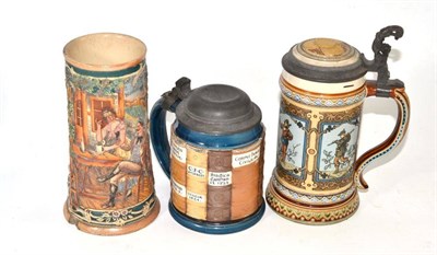 Lot 192 - A rare Mettlach stoneware tankard modelled as books and two stoneware beer steins (3)