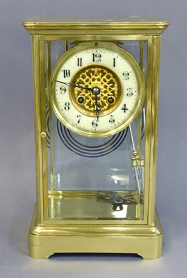 Lot 316 - A Brass Four Glass Striking Mantel Clock,...