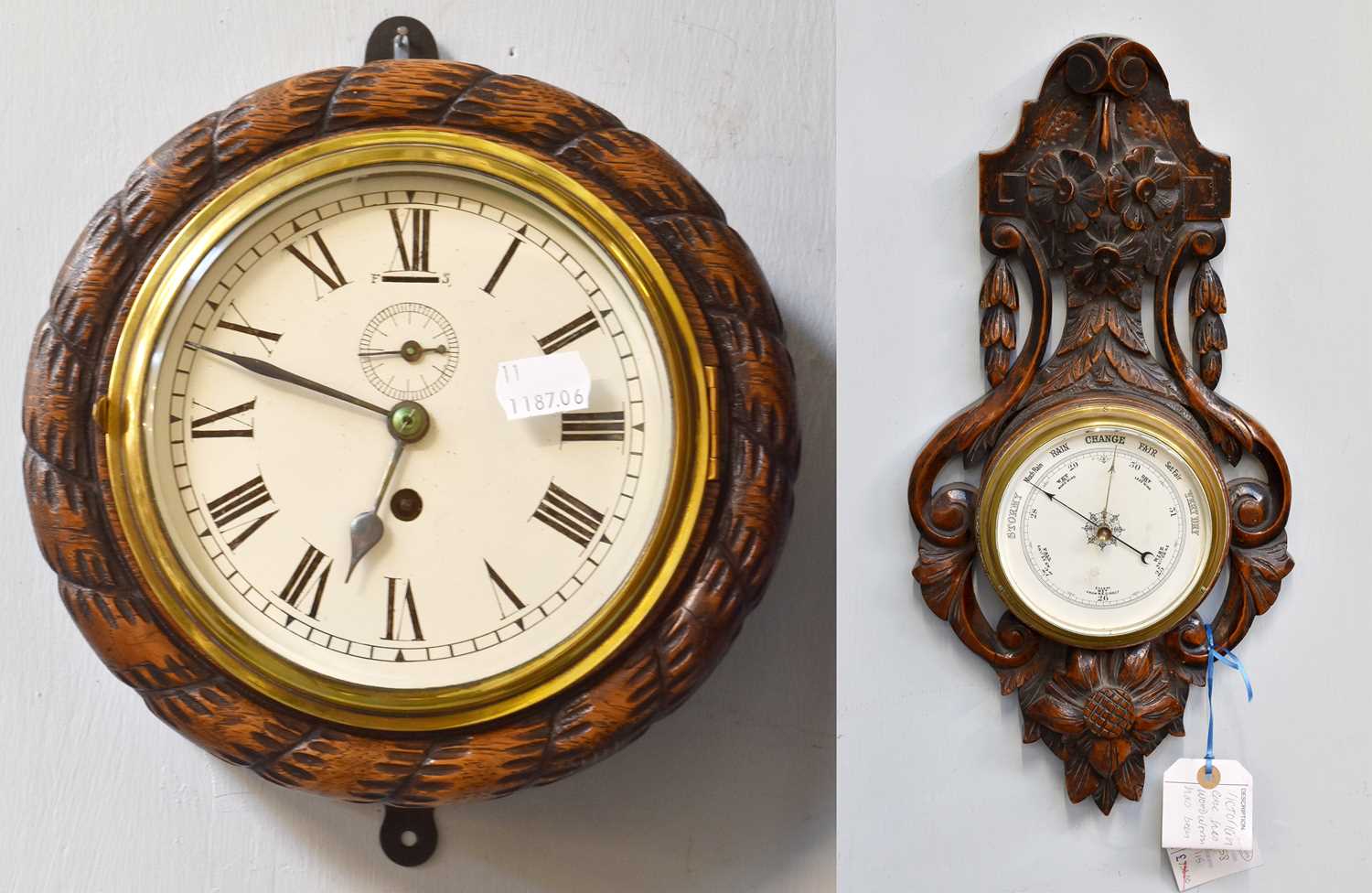 Lot 331 - A Bulkhead Clock, in a carved case, together